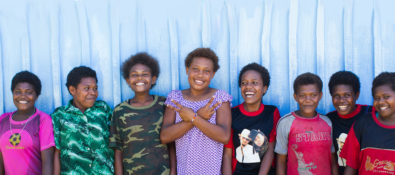 Young Papua New Guinean girls posing for a photo